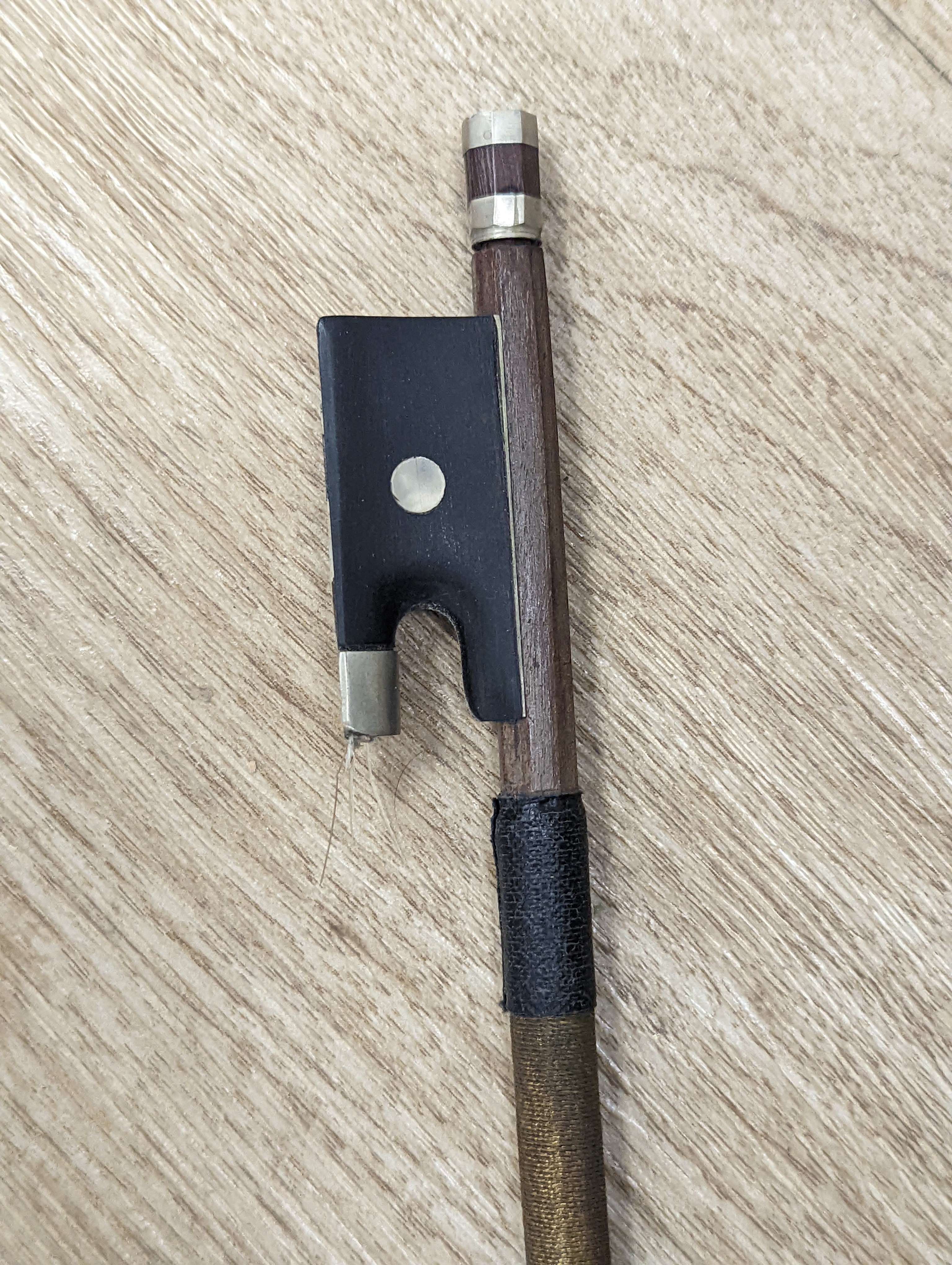 A late 19th century German violin and two bows, cased